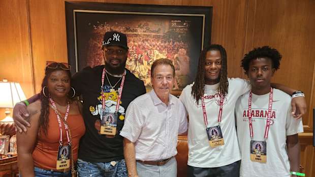 Myles Johnson with Nick Saban